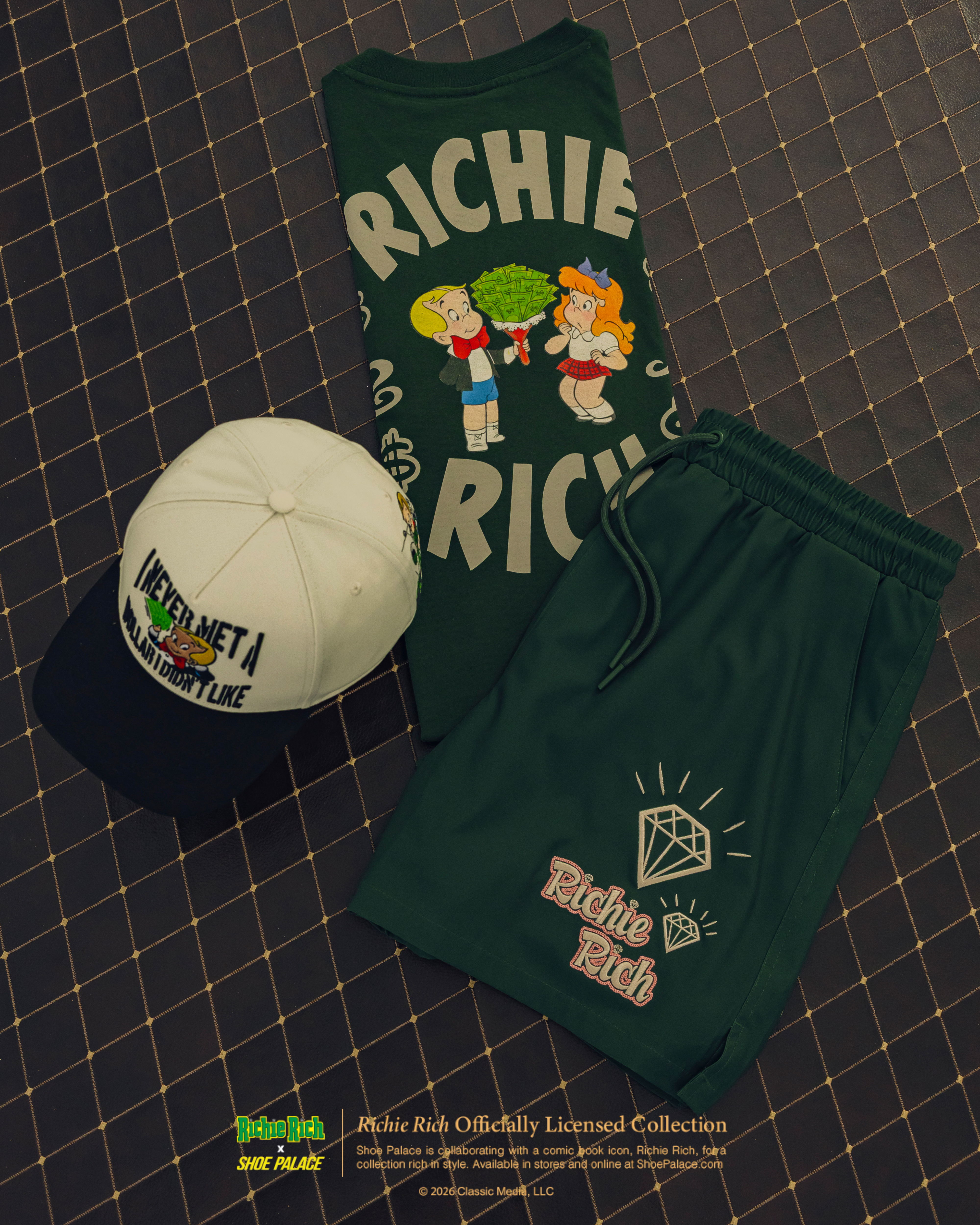 Richie Rich-themed clothing and cap displayed on a patterned surface.