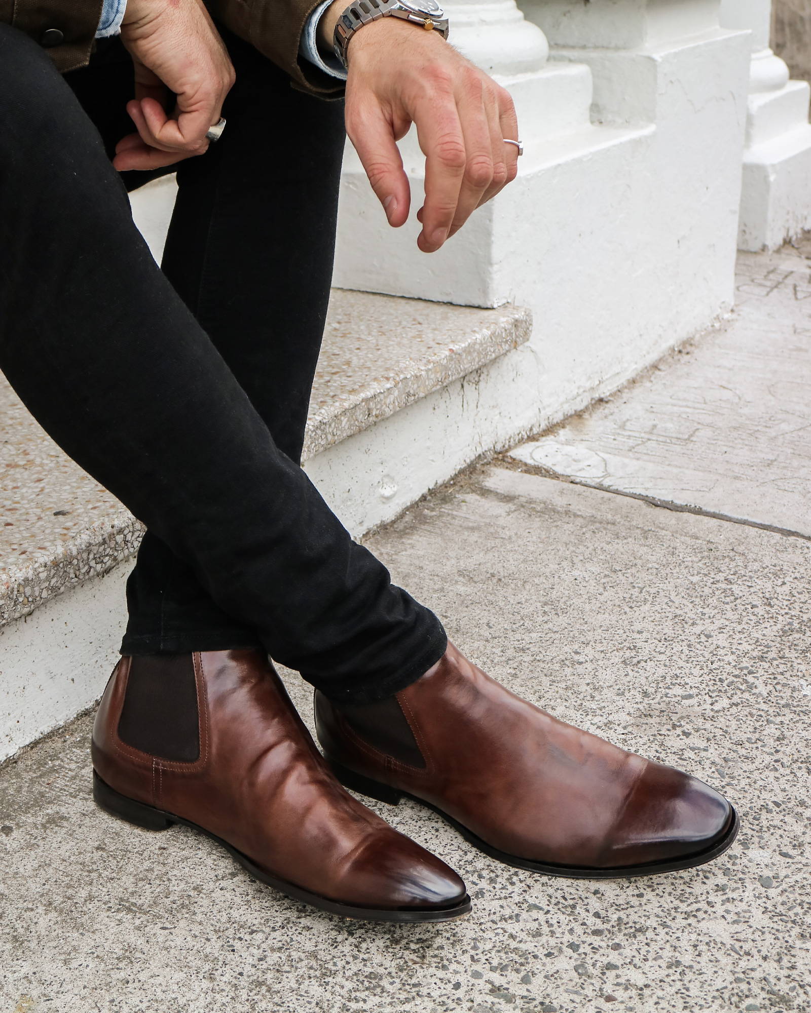Osbourne 2.0 T.D Moro Chelsea Boots in Brown worn with a black pant 