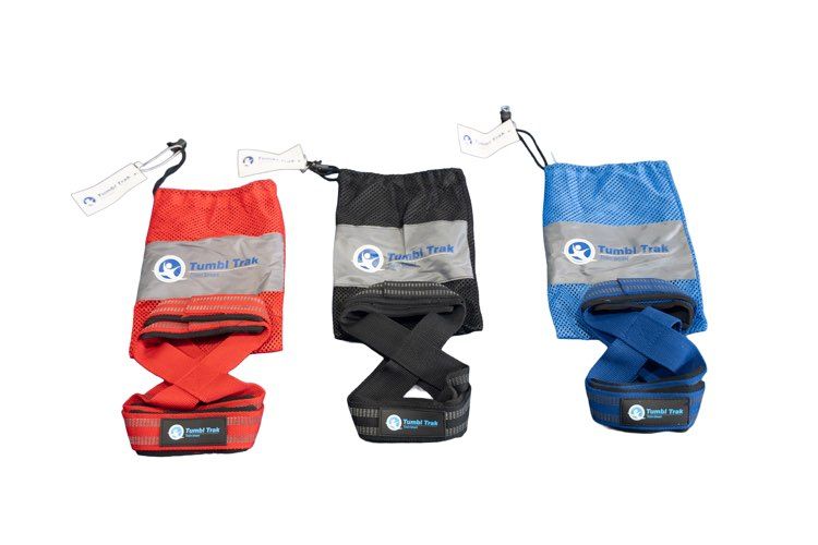 Three drawstring bags in red, black, and blue.