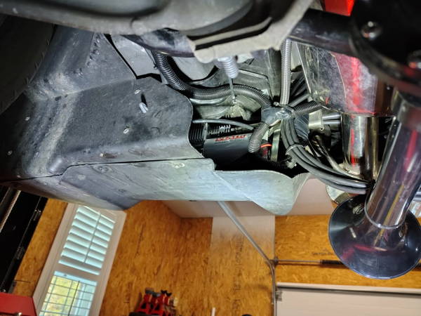 Finished front underbody Shocker XL horn install on a Corvette