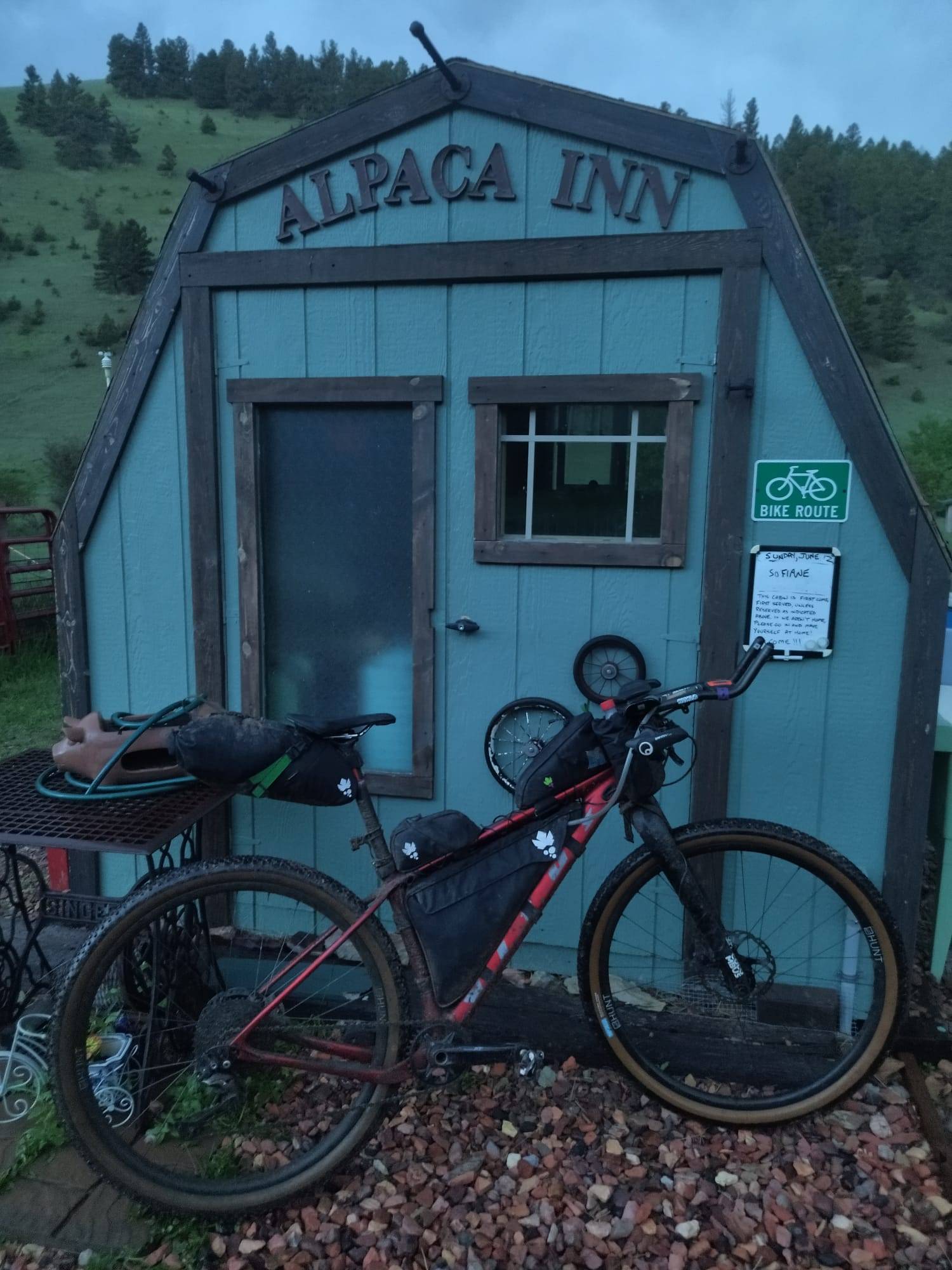 Sofiane's bike against a cabin