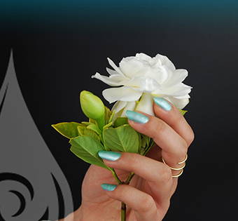 kapoho dreams toxin free nail polish on hand holding flower