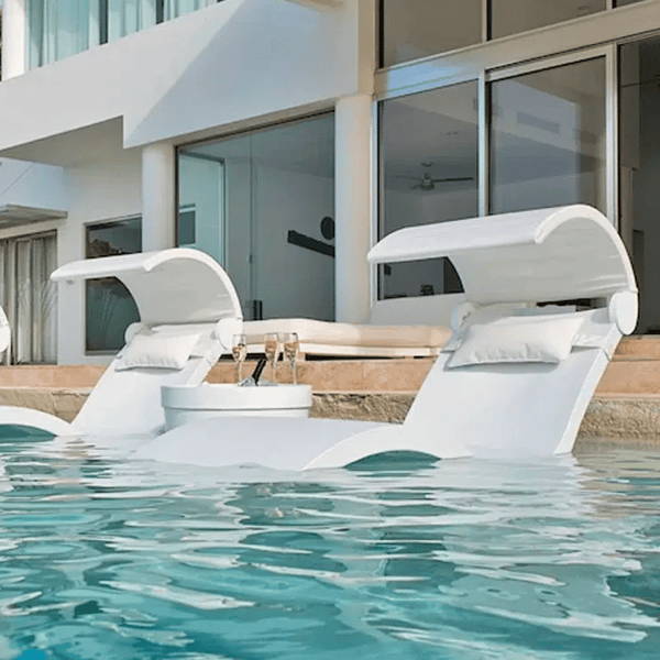 Signature in-pool chaise lounge chairs with media screen on baja shelf.