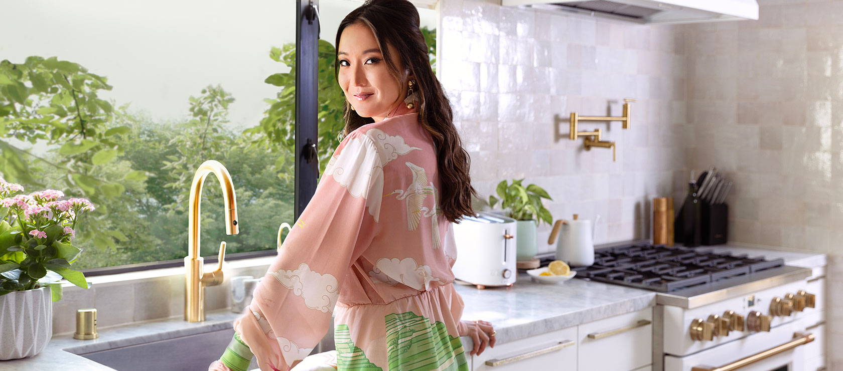 Ashley Park in her kitchen
