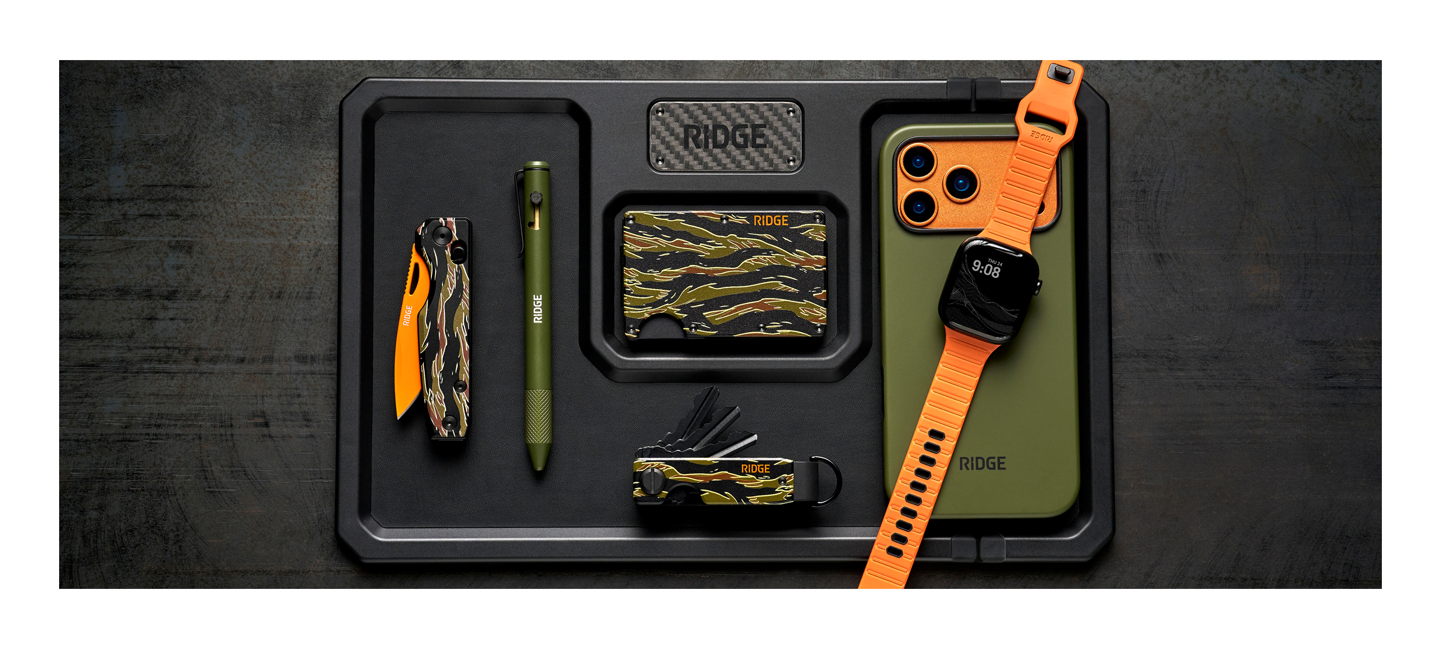 A collection of tools and accessories on a tray.