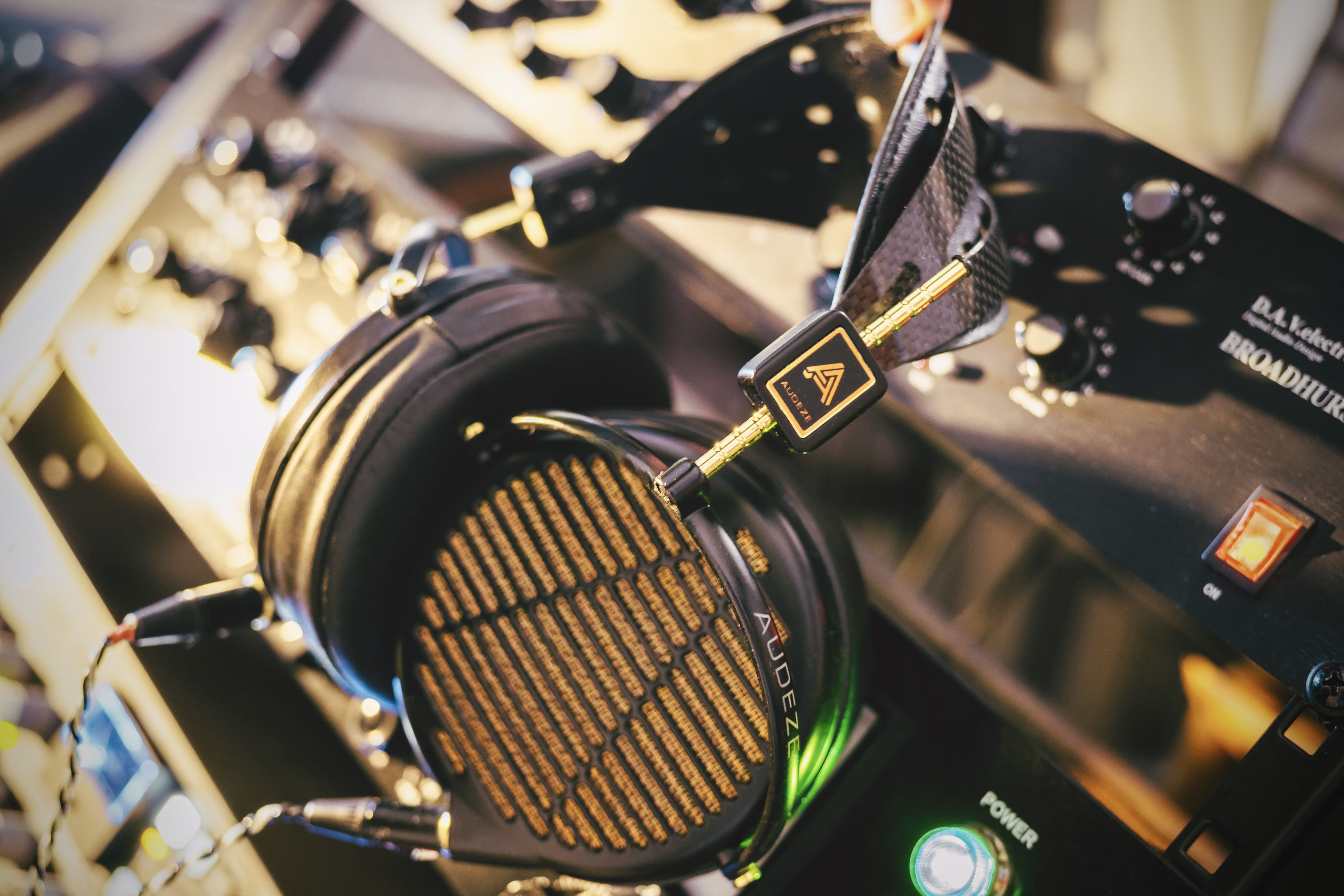 Audeze LCD-4z hanging off mixing table 