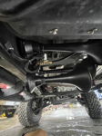 Undercarriage four matte black air horn trumpets solenoid valve frame mount Jonathan's 2020 Nissan Titan Outlaw 228H train horn kit gallery photo 4
