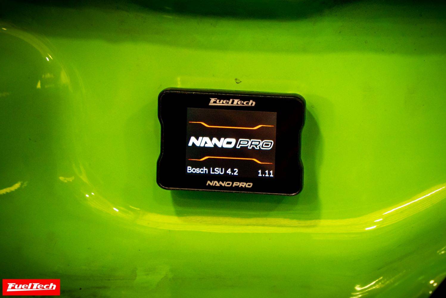 FuelTech NanoPRO O2 conditioner with color touchscreen, customizable gauge display, and virtual switch panel.