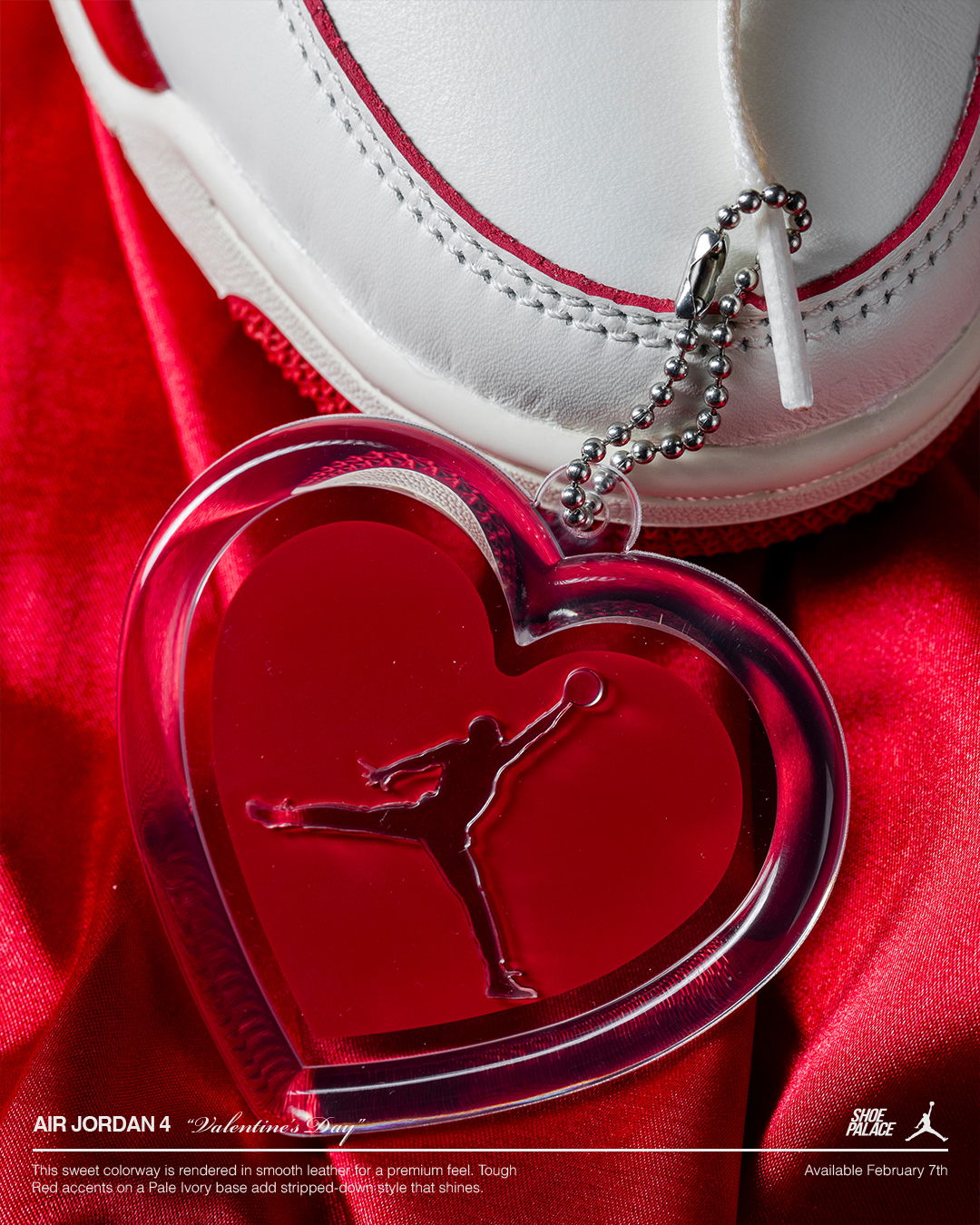 Air Jordan 4 - A sneaker with a heart-shaped keychain featuring a basketball silhouette.