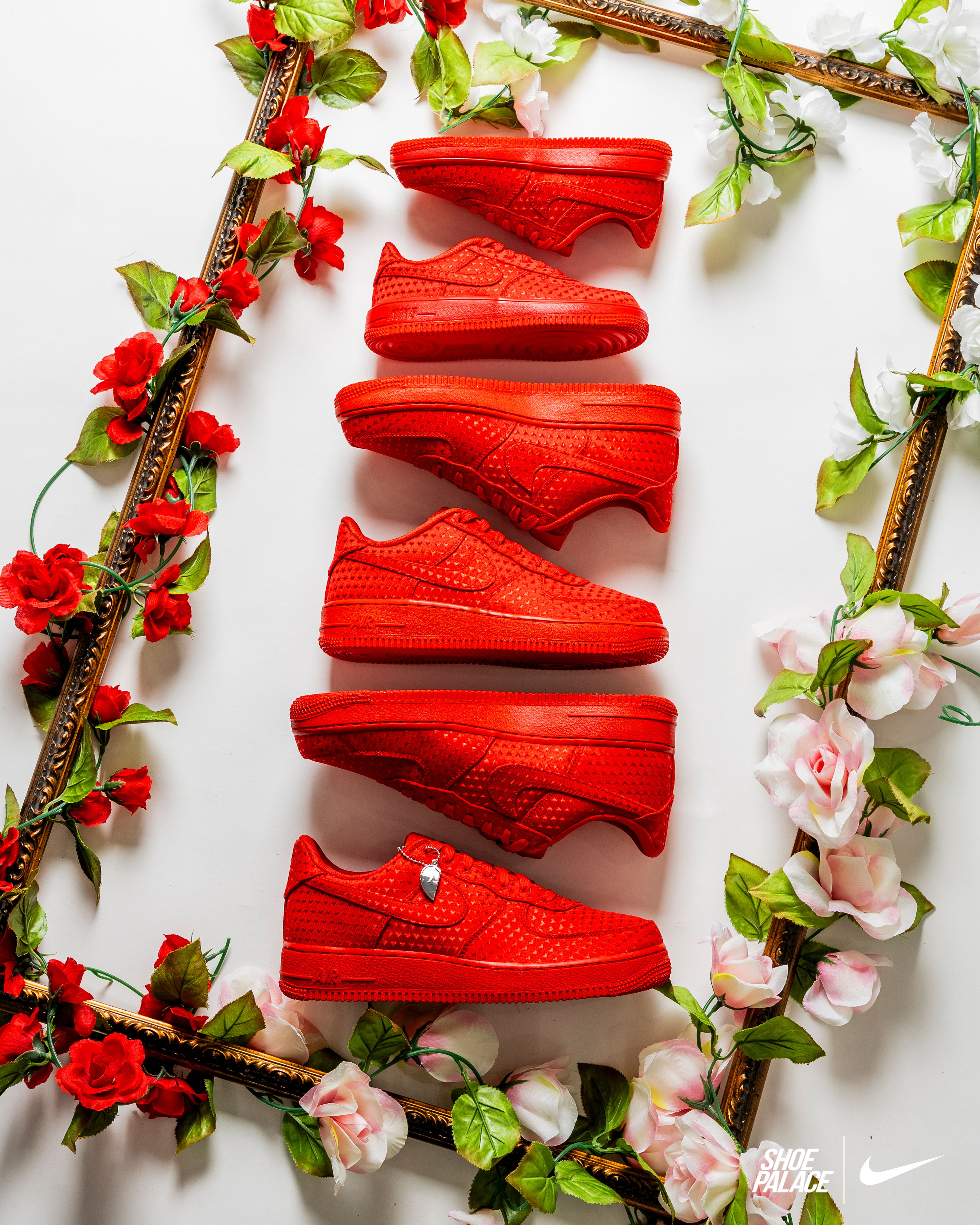 Red sneakers arranged in a floral frame.