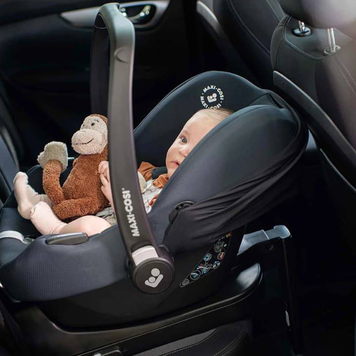Baby in a Maxi-Cosi car seat