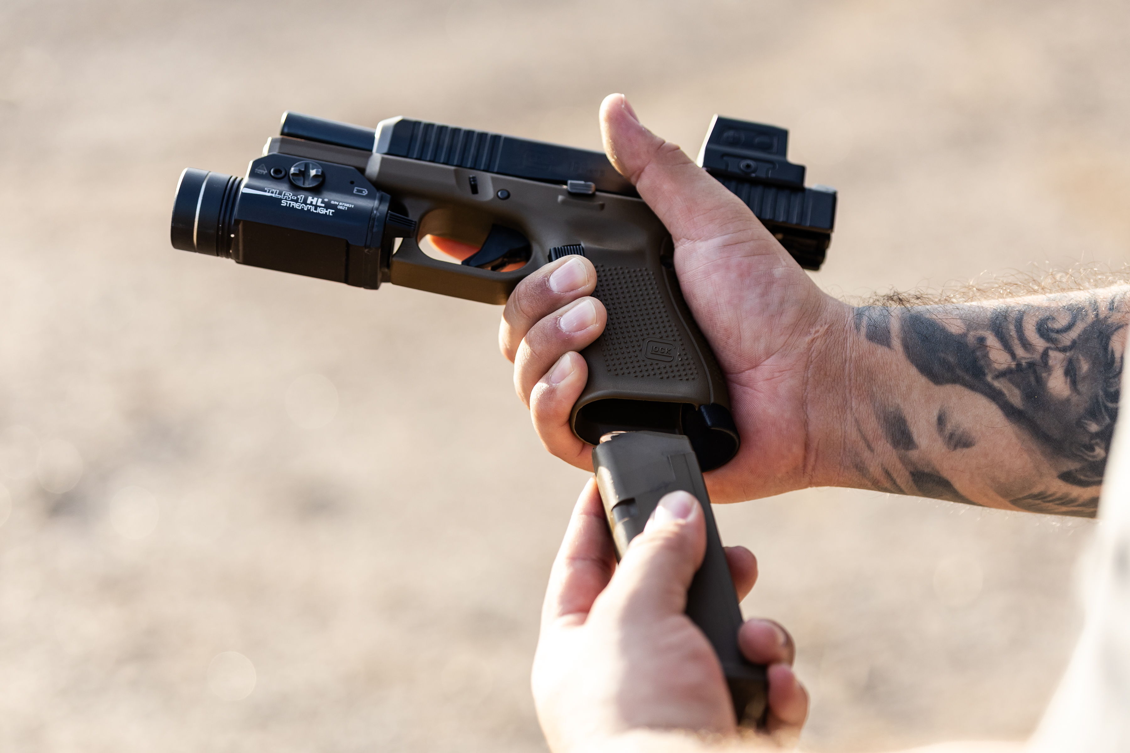 LTT Grip Anchor for a Glock Gen 5 at an outdoor range.