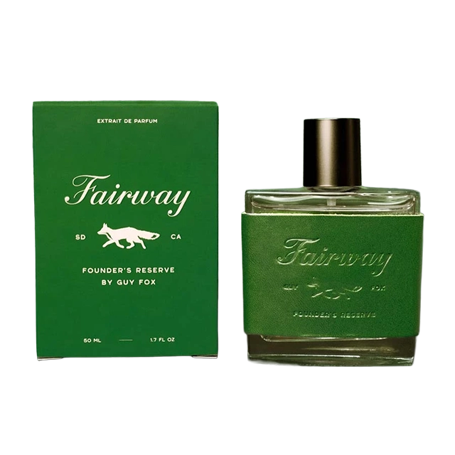 Green perfume bottle and box labeled 