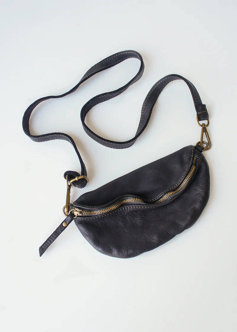 A black leather bum bag with metallic bronze zip
