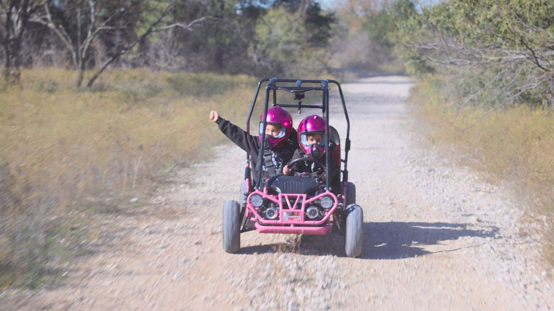 kids riding Trailmaster Mini XRX+ go kart