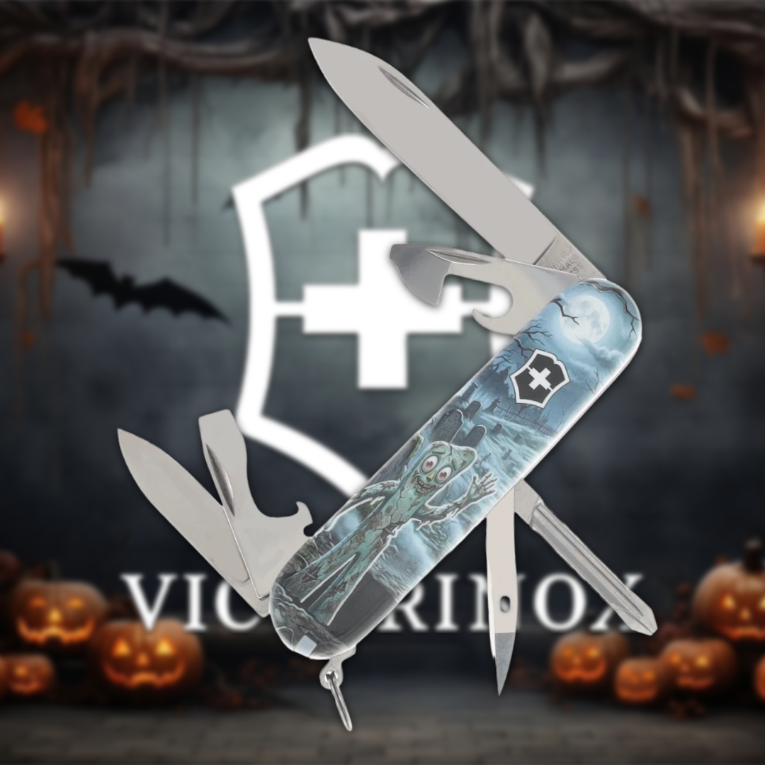 Multi-tool knife with Halloween-themed design against a spooky background.