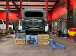 Hood open garage HornBlasters train horn dixie horn air source unit product boxes blue coiled hoses Jay's 2024 Tundra 228H gallery photo 3