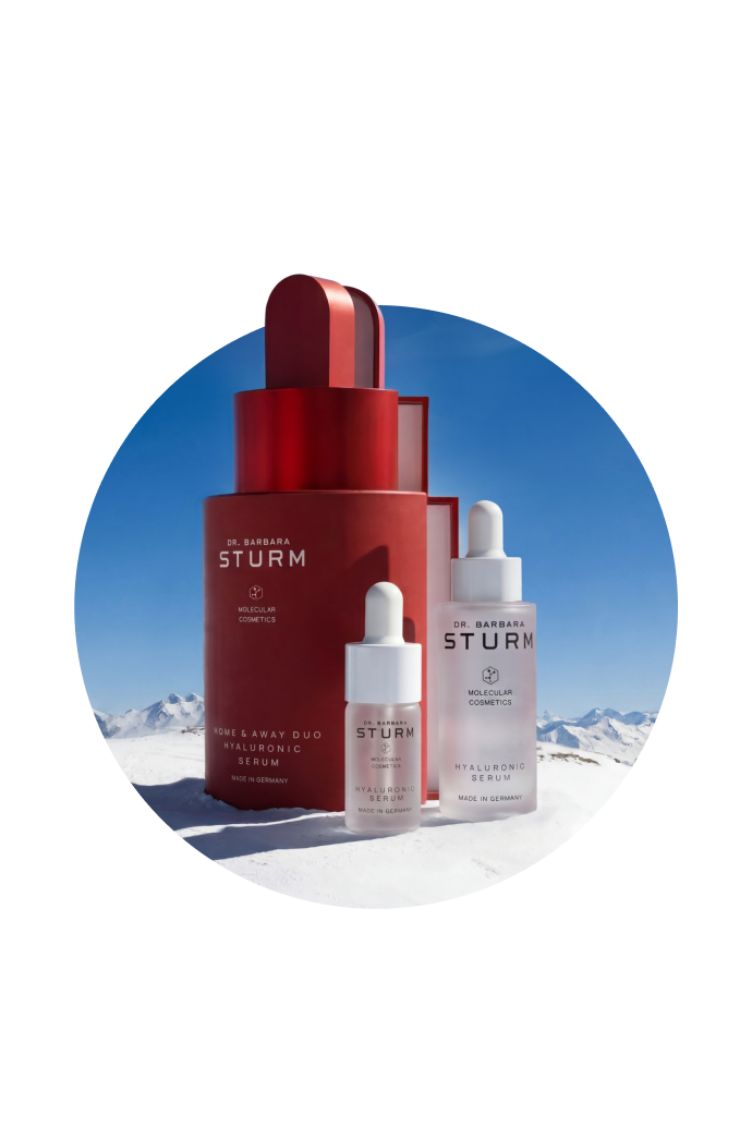 Three skincare products on a snowy background in a circular frame.
