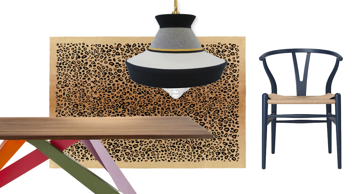 Decorative furniture including a table, Carl Hansen chair, light fixture, and patterned rug.