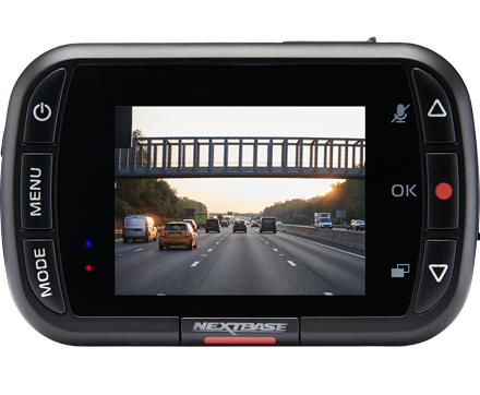 Dashboard camera displaying a highway scene with vehicles and an overpass.