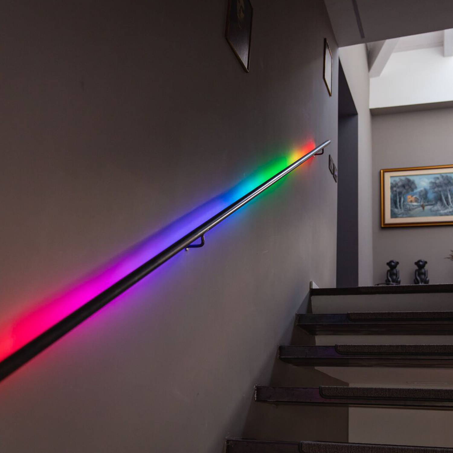 A multicoloured Twinkly Line running along a handrail.