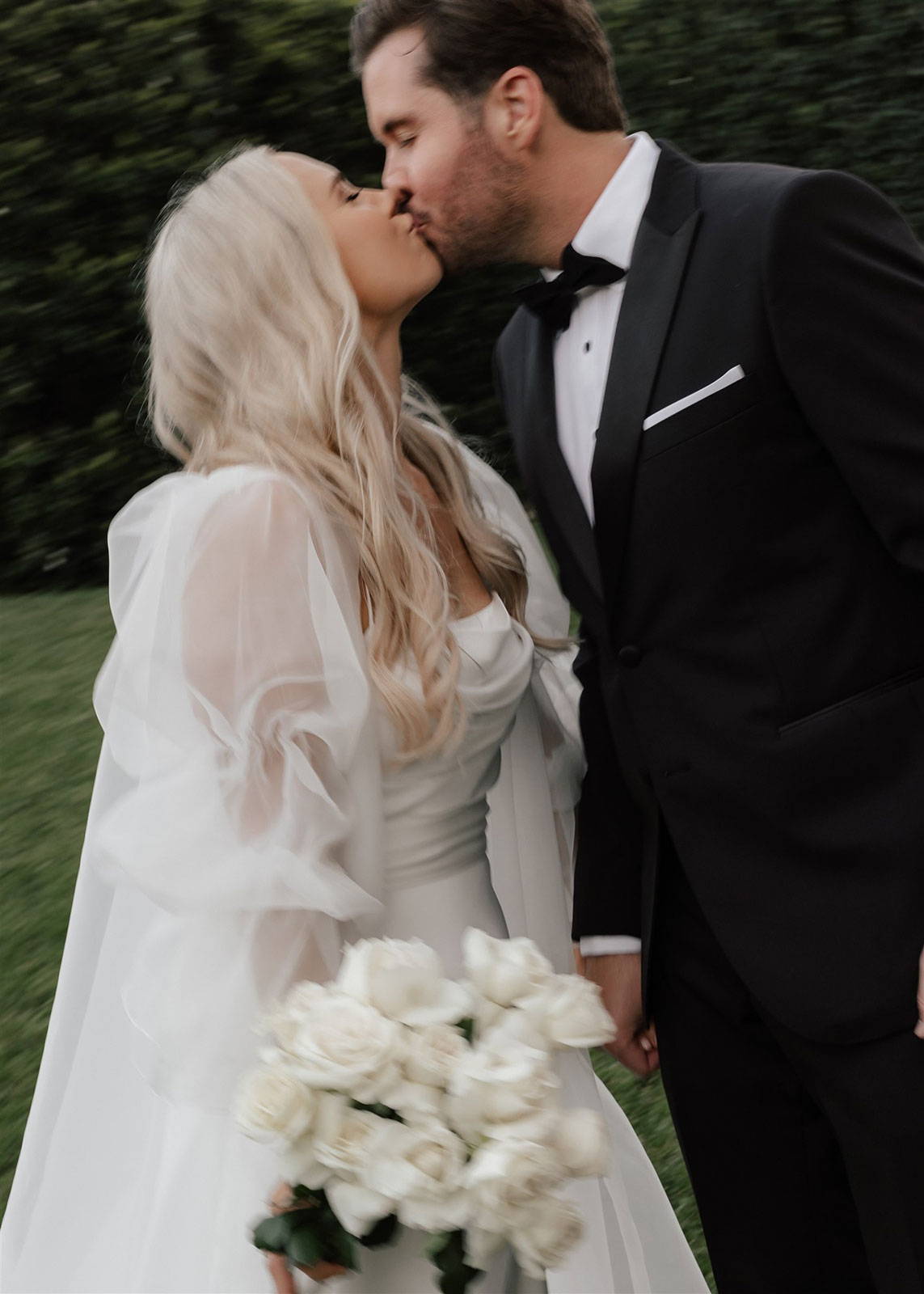 Bride and groom sharing a kiss