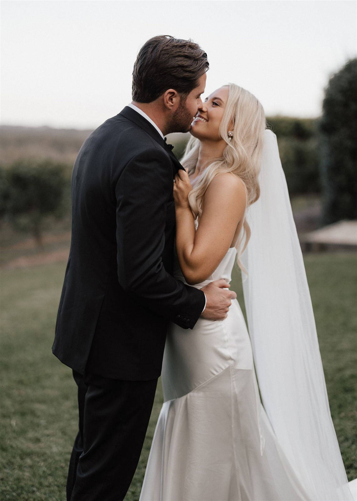 Bride and groom sharing a kiss