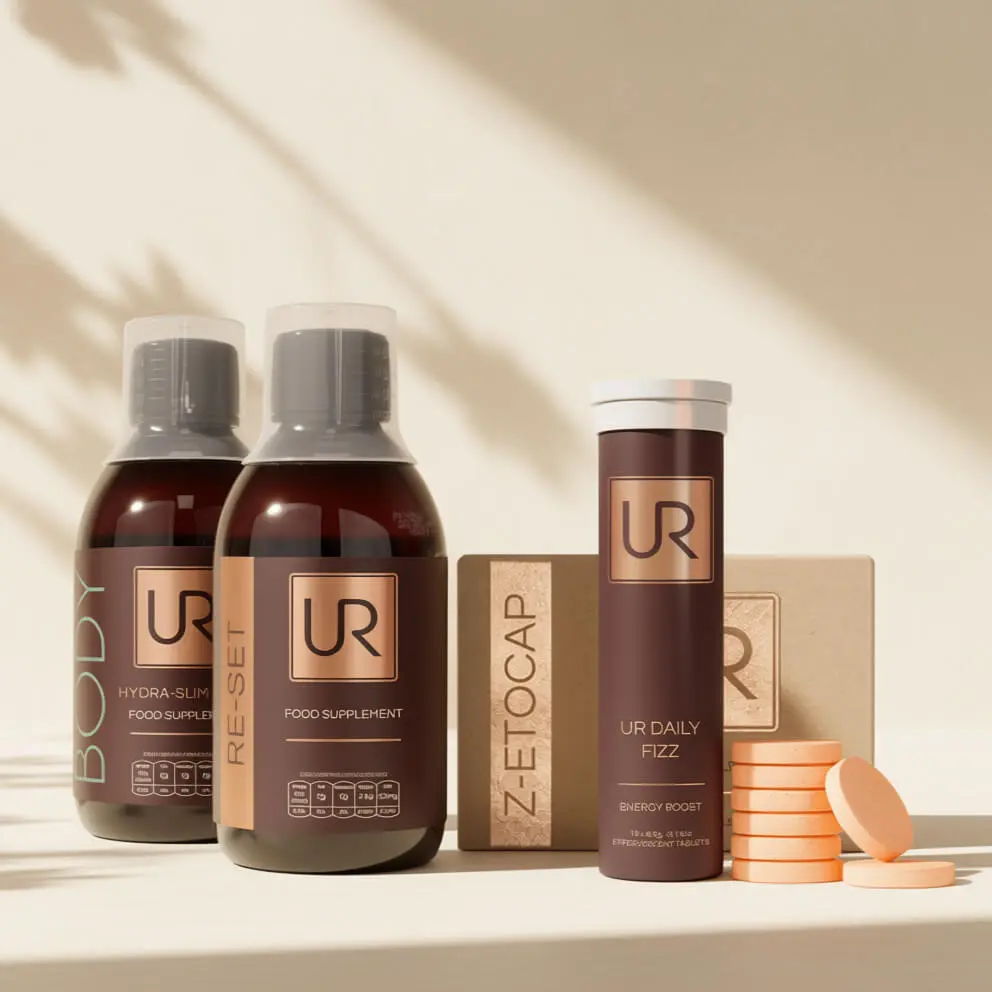 Bottles and packaging of wellness products on a shelf with soft lighting.
