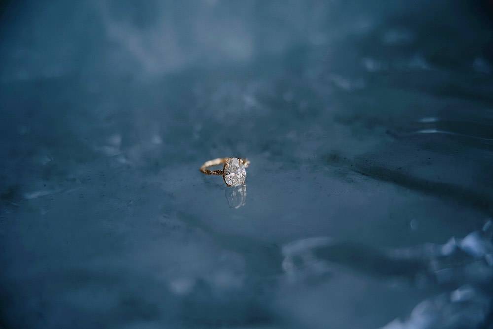 oval diamond ring on ice