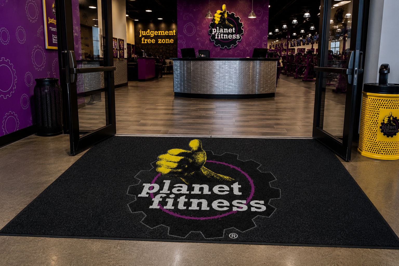 Planet Fitness Logo on Floor Gripper mat at Planet Fitness Entrance.