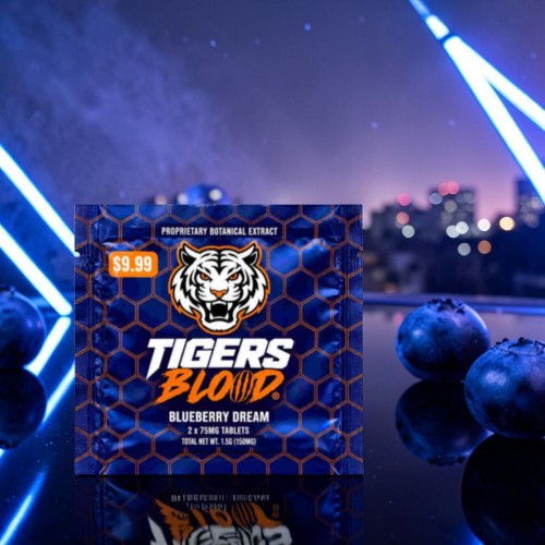 A product box with blueberries, featuring a tiger logo and neon lights.