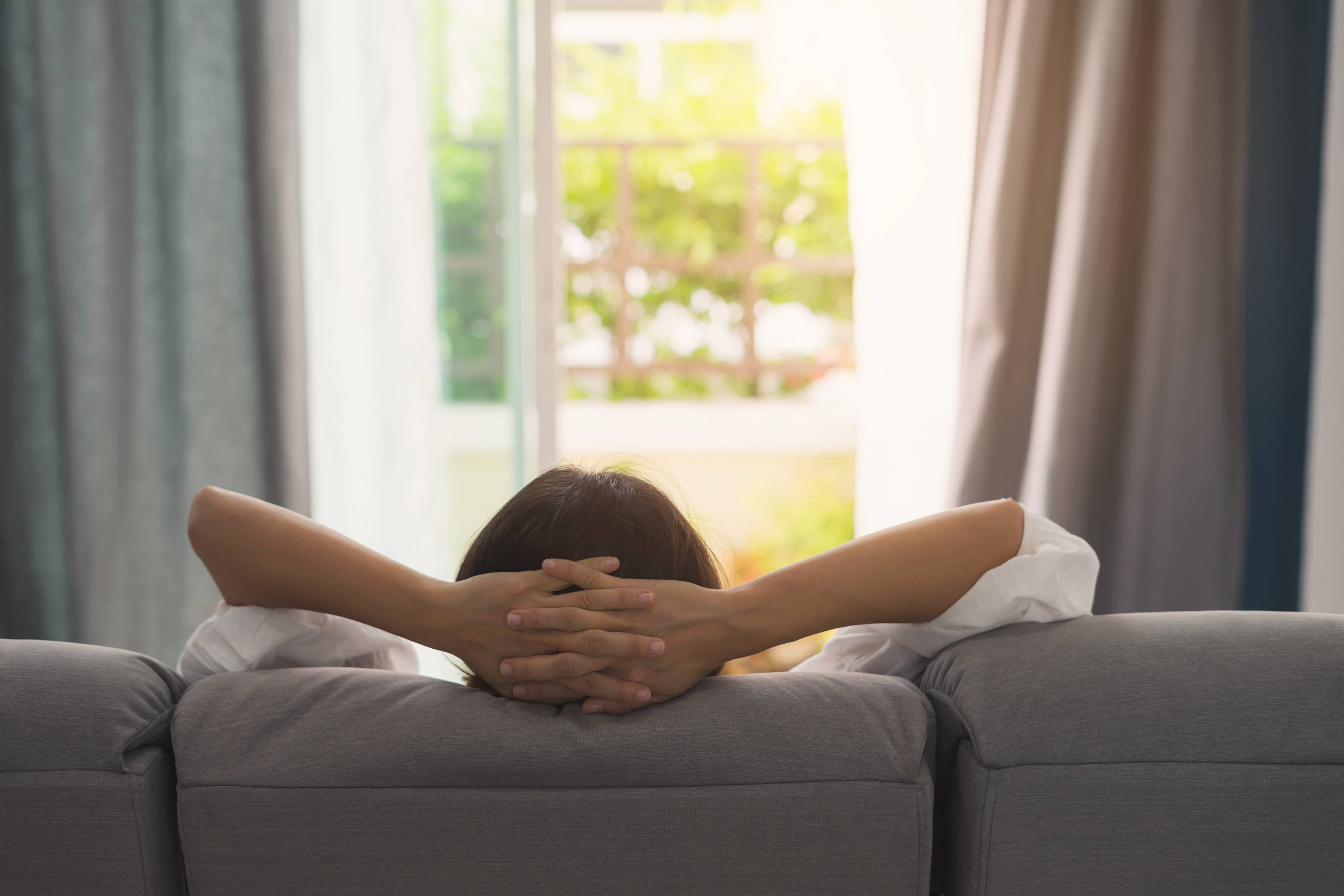 Woman relaxing on couch