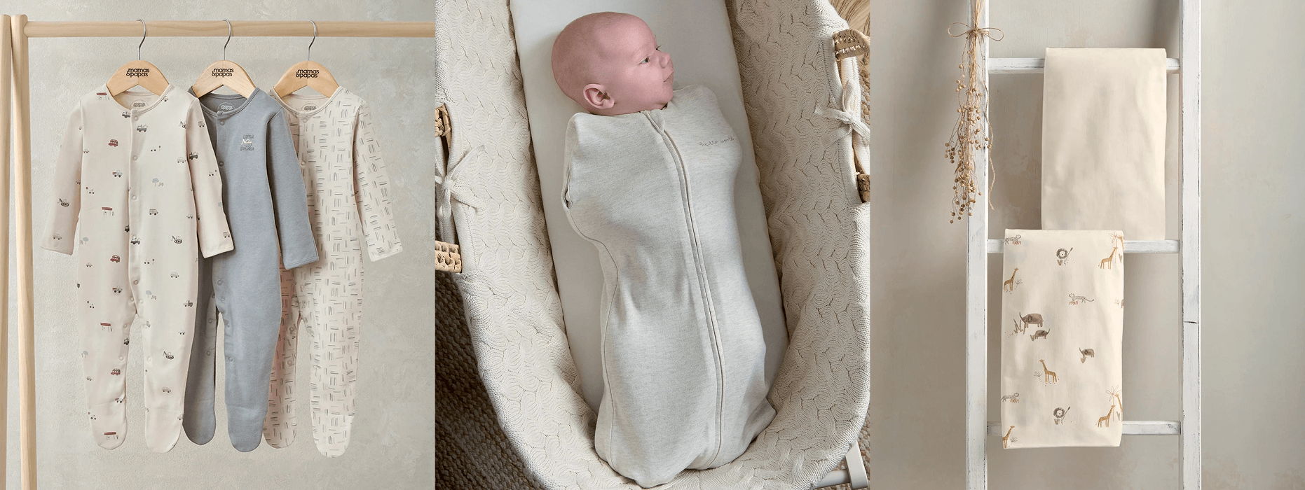 Baby swaddled in fabric, hanging clothes, and a decorative towel rack.