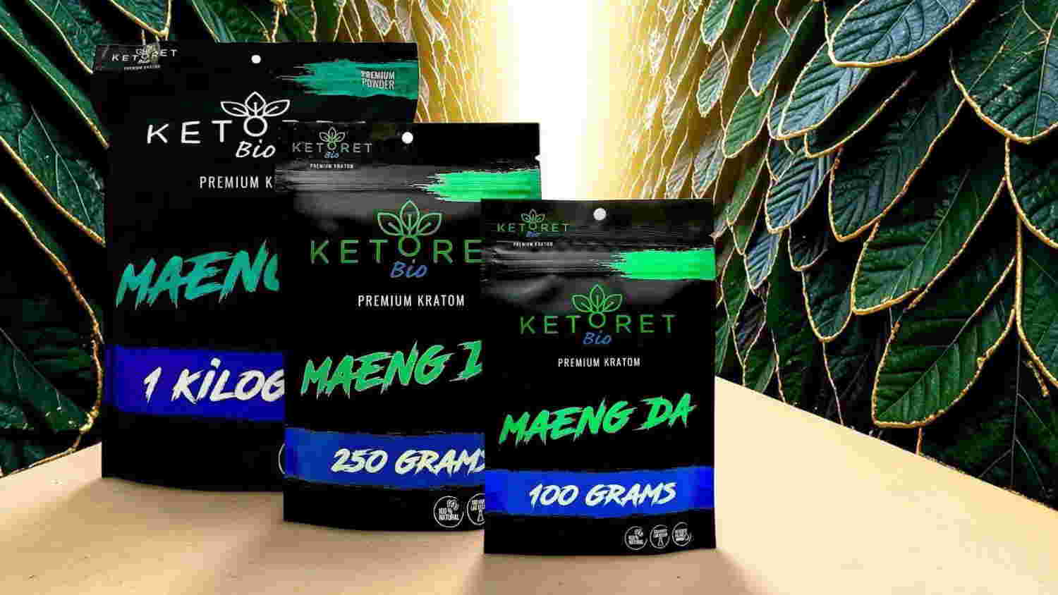 Three packages of Ketone products on a wooden surface with green leaves in background.