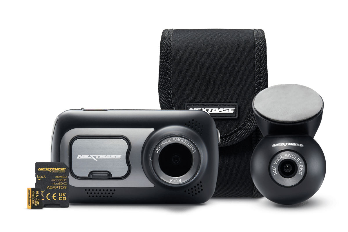 Dashboard camera set with accessories including a storage card and mount.