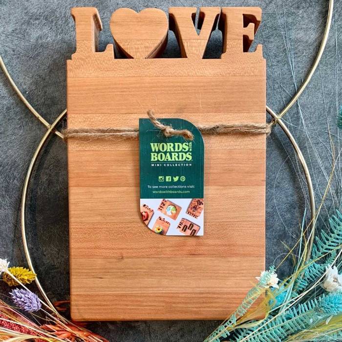 Wooden Cutting Board with Love written at the top