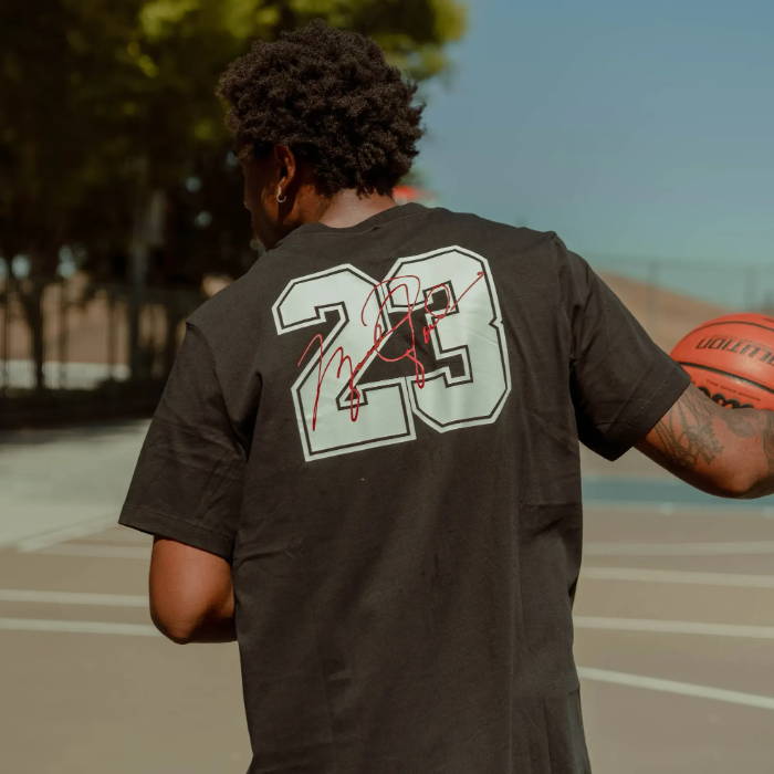 male model playing basketball