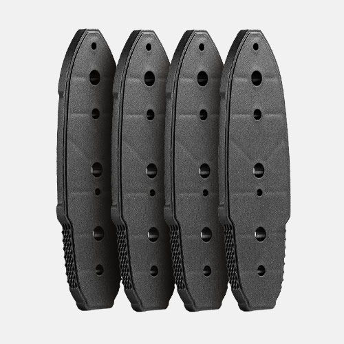 Four black rubber weight plates stacked vertically.