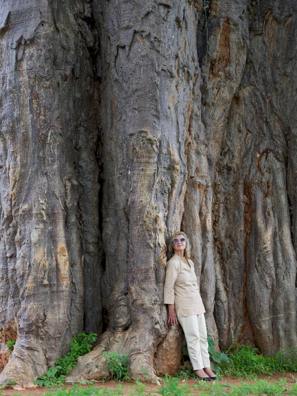 Sylvie Chantecaille by a large tree