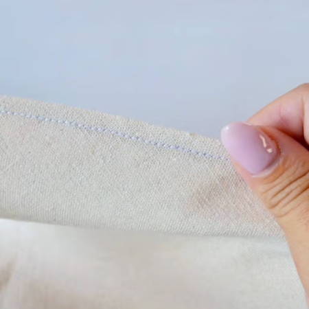 Straight top stitch sewn around the perimeter of the flower bag