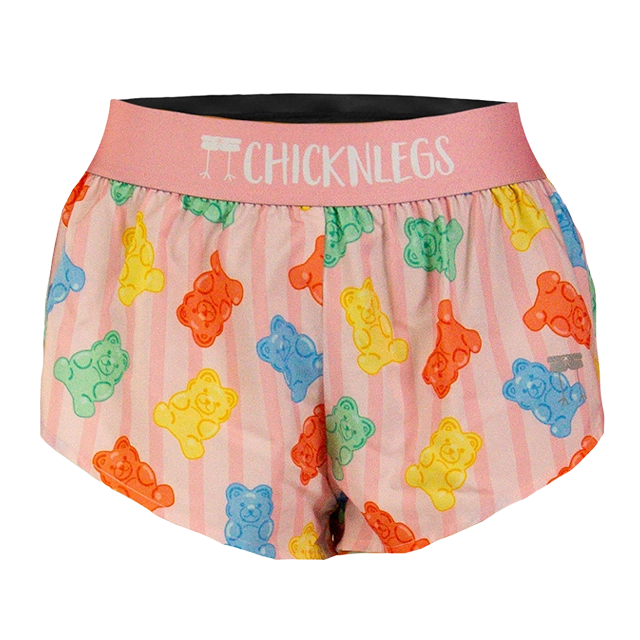 Colorful bear-patterned shorts with a pink waistband labeled 
