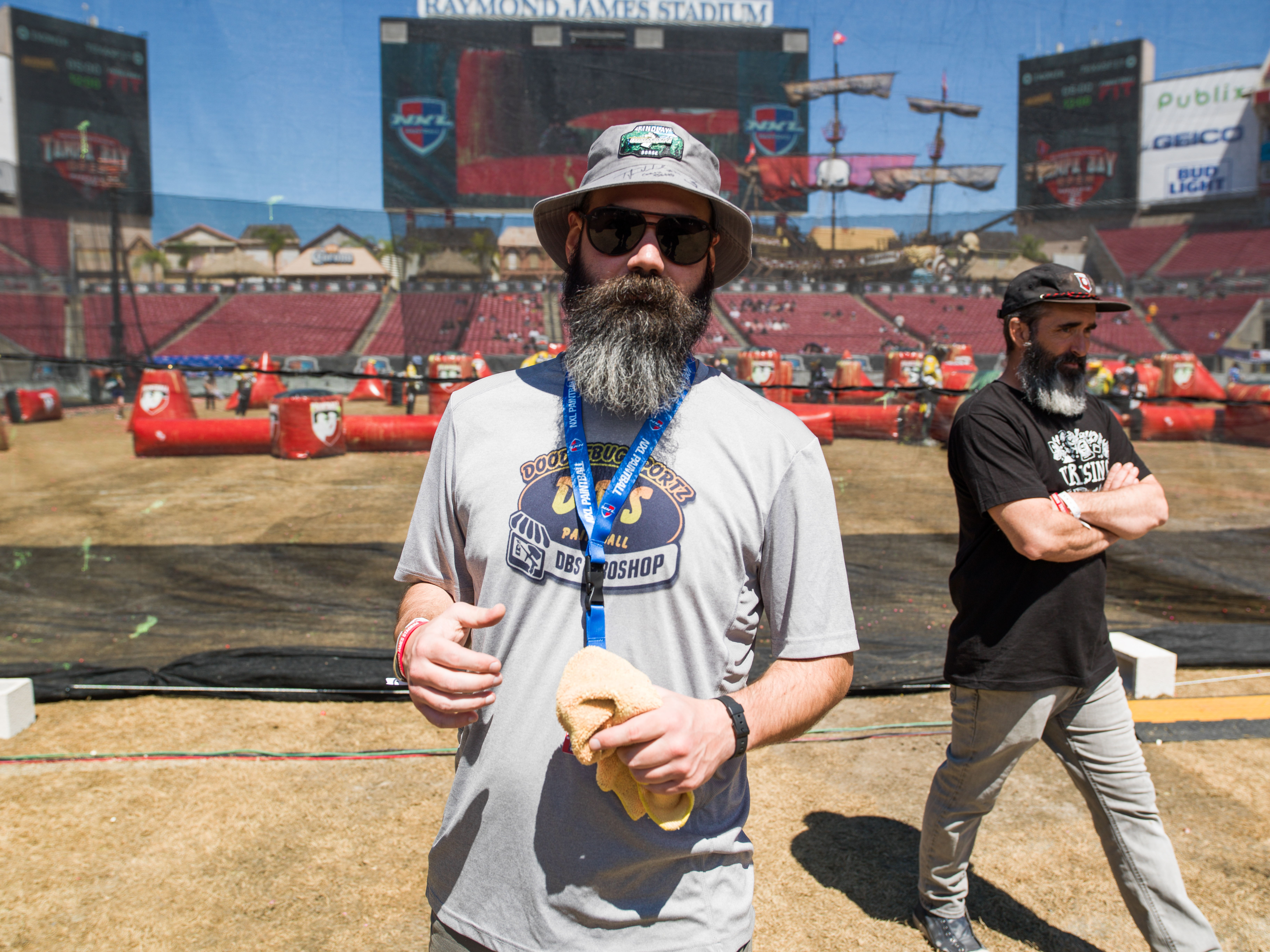 Bearded man at paintball field in NFL stadium