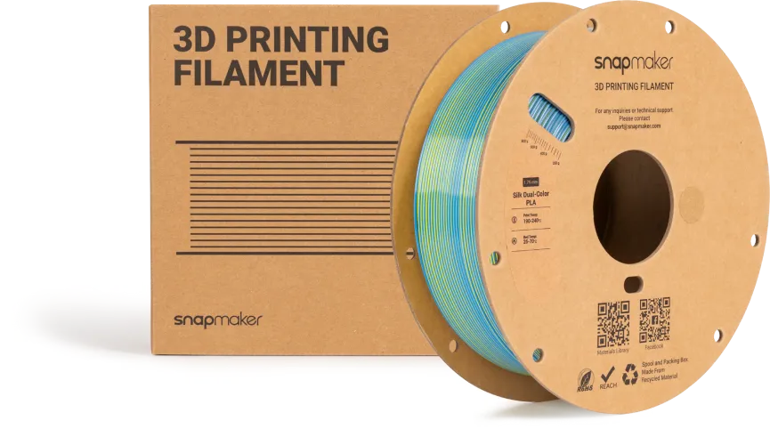 3D printing filament spool beside its packaging box.