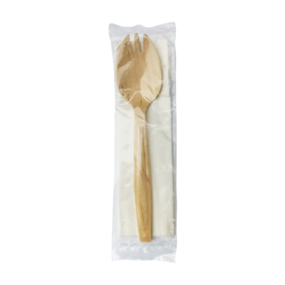 A wooden spork kit with a napkin in a plastic sleeve