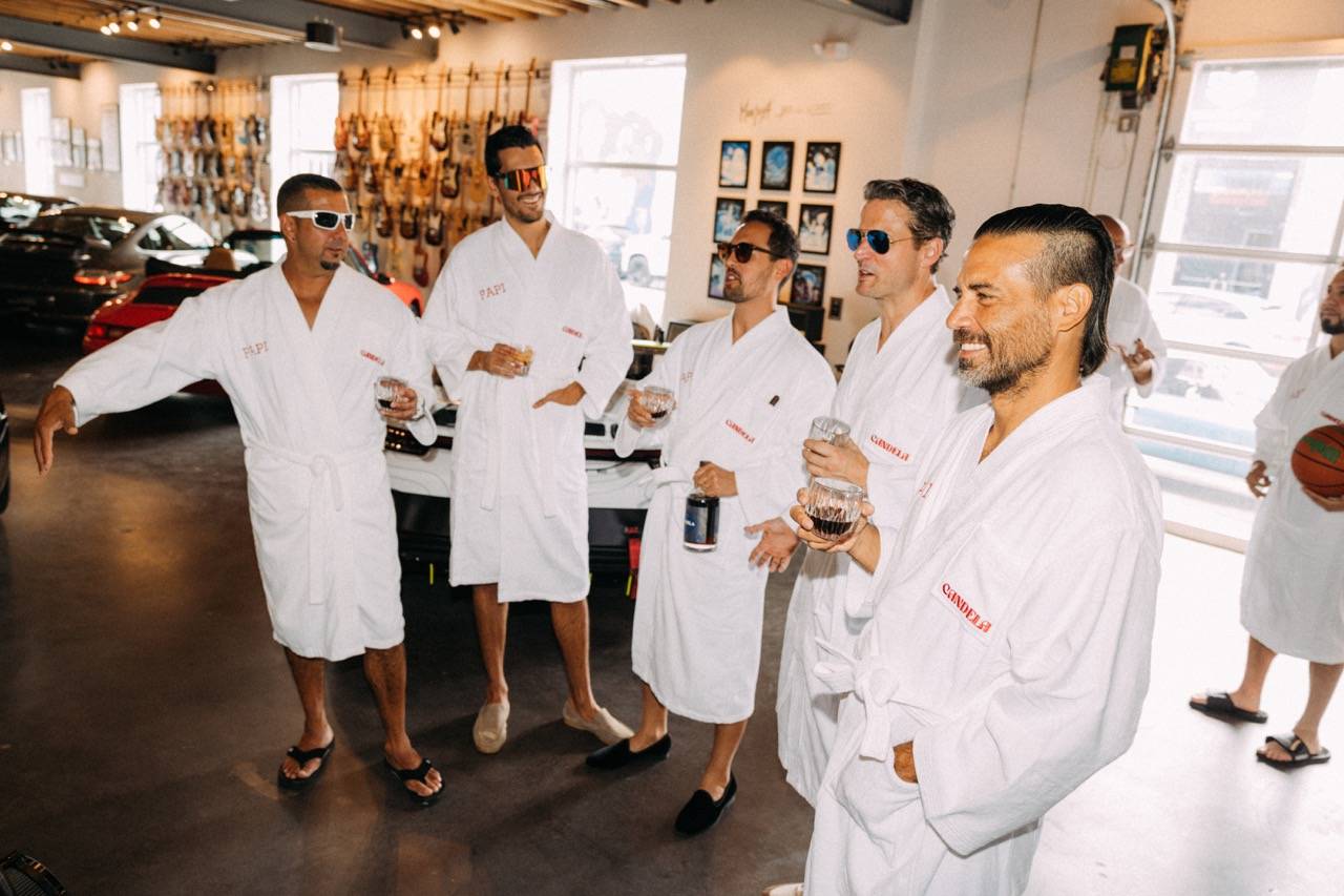 Candela Mamajuana Father's Day Robes, men drinking mamajuana in vintage car garage