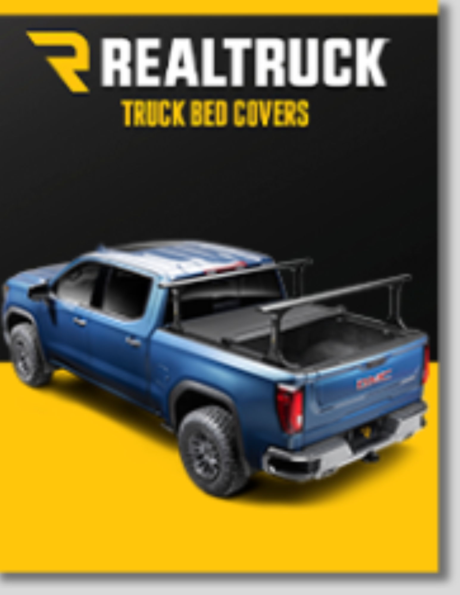 Blue truck with a truck bed cover on a yellow and black background.