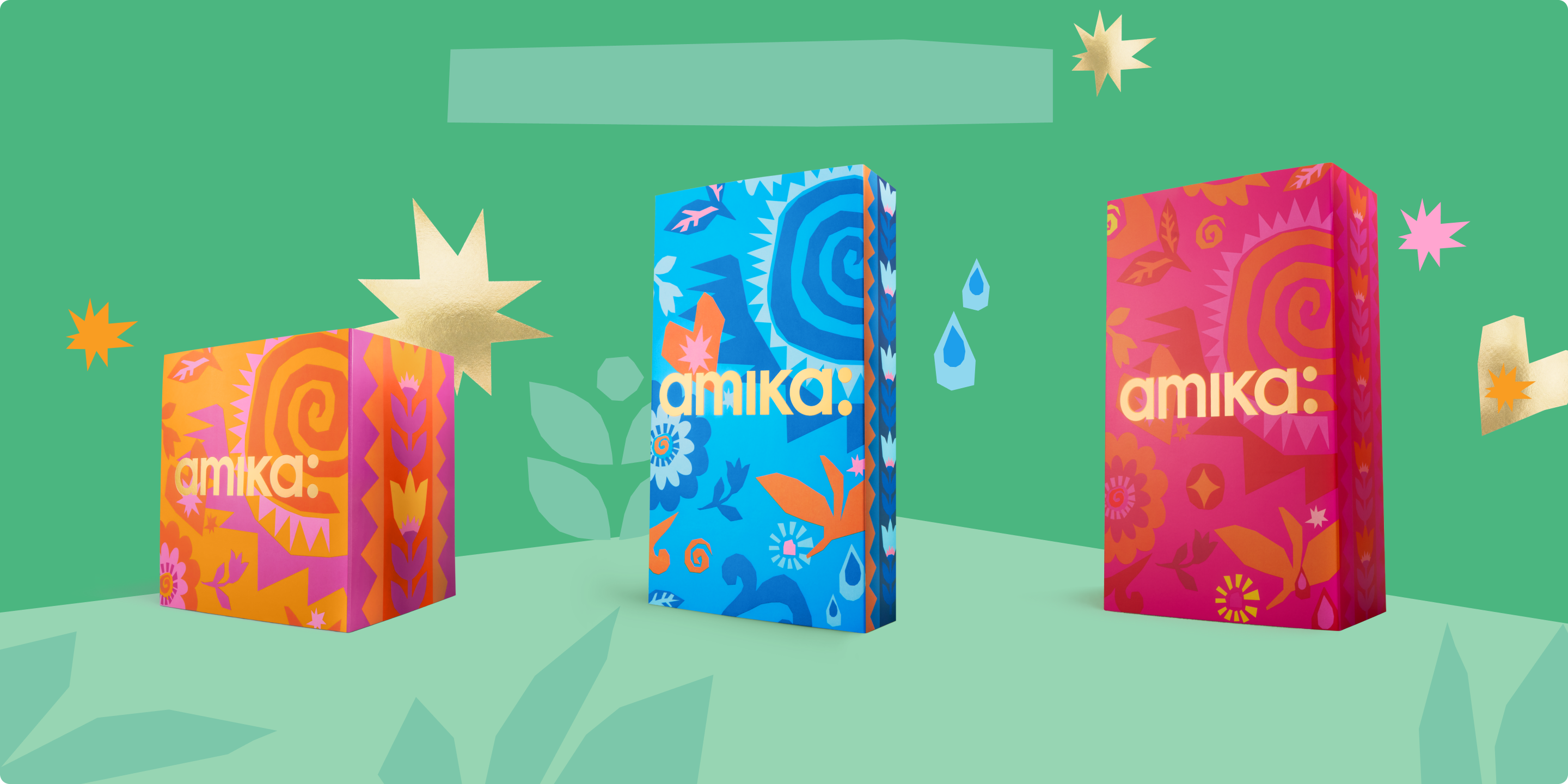 Three brightly colored product boxes on a green background with decorative elements.
