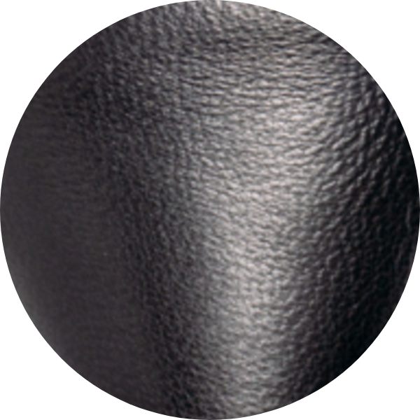 Textured black surface in a circular shape.