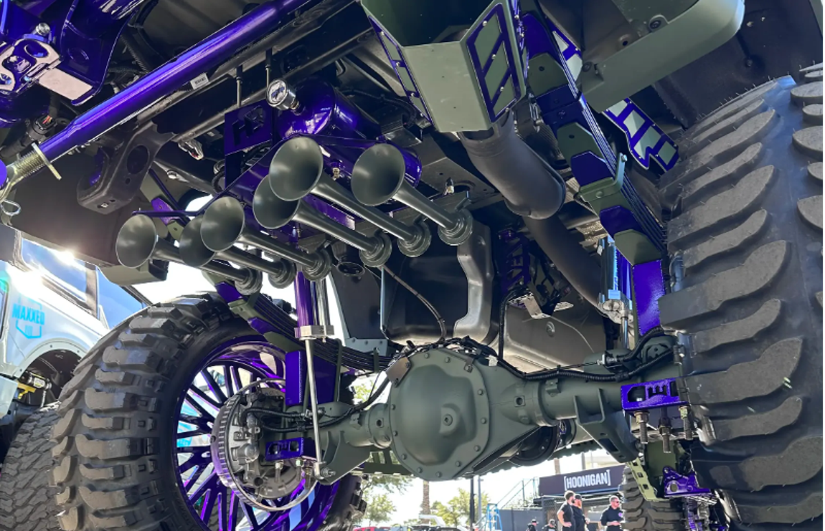 Custom truck undercarriage with air horns, tank, and onboard air system