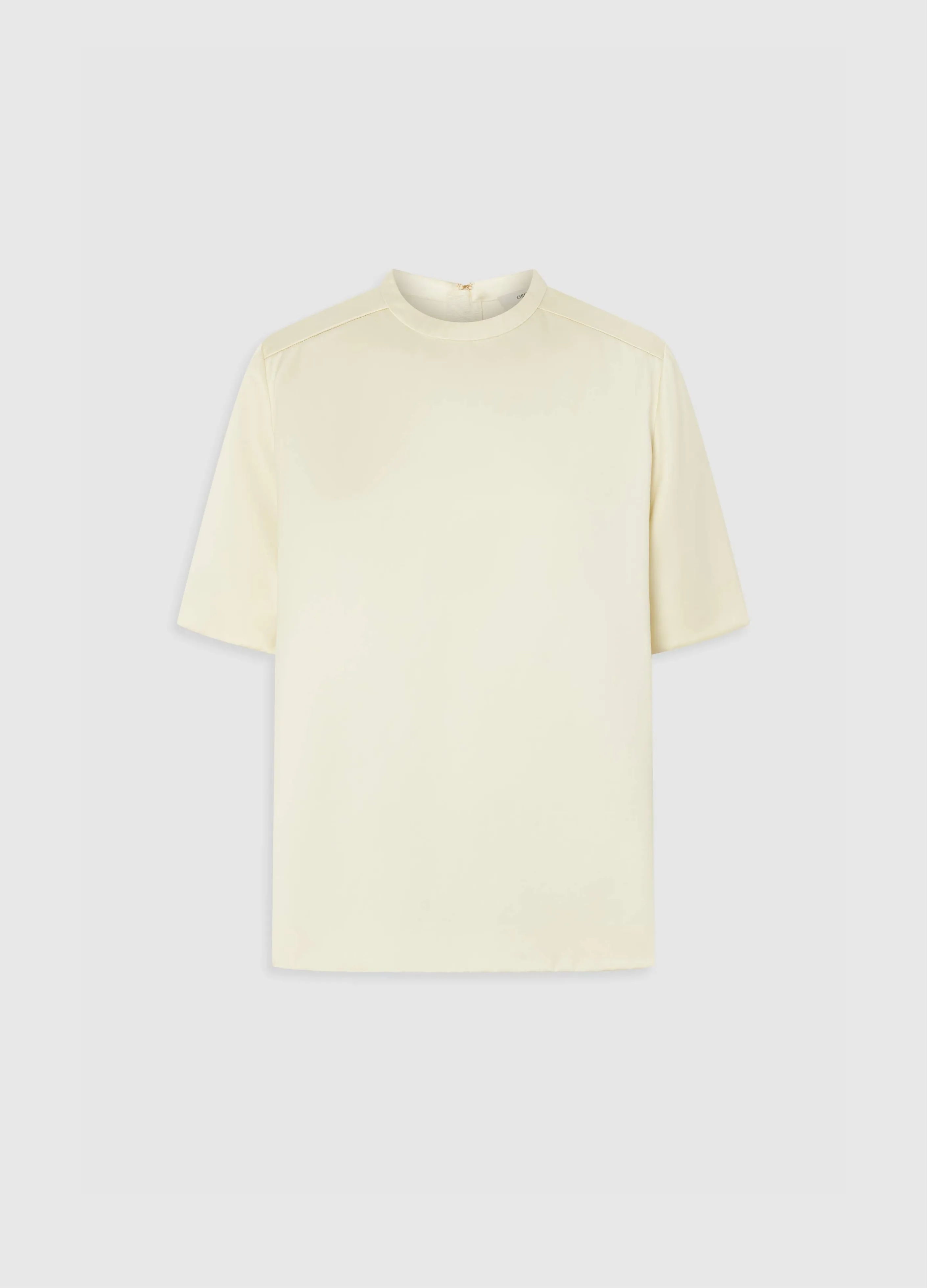 Cream short-sleeve t-shirt on a plain background.